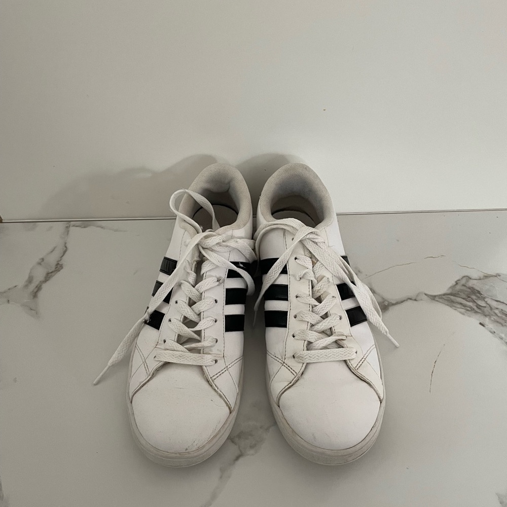 Black and white adidas sneakers